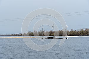 Wake cable park for wakeboarding on river. Pulley system reverse equipment wakeboard in water. Traction water snowboard halyard photo