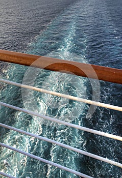 Wake Seen through a Railing from a Cruise Ship