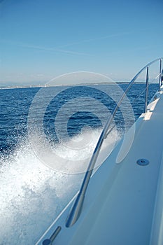 Wake on the side of speed boat