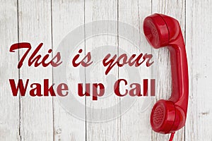 Wake up call text with retro red phone handset