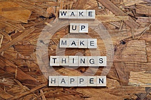 wake up make things happen text on wooden square, motivation quotes