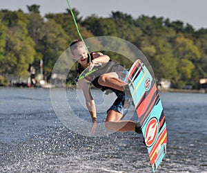 Wakeboard jump over wave