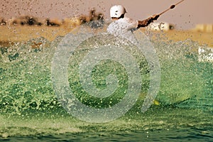 Wakeboarder sportsman in the cablepark