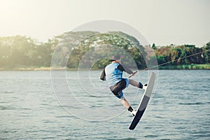 Wakeboarder trains in the lake