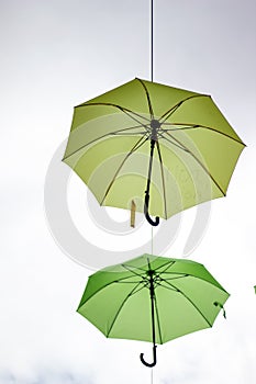 Wales, Caernarfon. Green umbrellas as decoration.