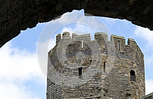 Wales, Caernarfon. View from the gate of the historic castle into the Royal town to the Well Tower.