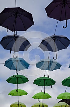 Wales, Caernarfon. Whimsical multi coloured umbrellas.