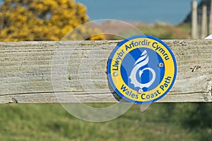 Wales Coastal Path waymarker