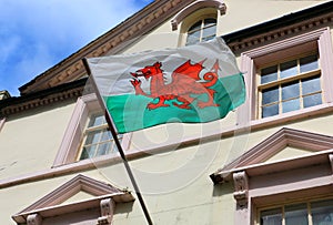 Wales flag on a building in the town of Caernarfon,Great Britain