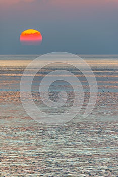 Wales sunset over water portrait