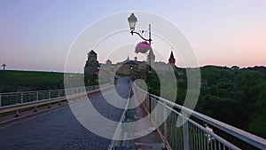 Walk across the Castle Bridge to the Kamianets-Podilskyi Castle, Ukraine