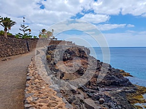 Walk along the Barranco del Quiquere between the coastal towns of Puerro del Carmen and Puerto Calero. Lanzarote, Spain photo