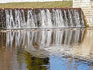 Walk around the river in the city.