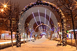 Walk of the city at night in winter