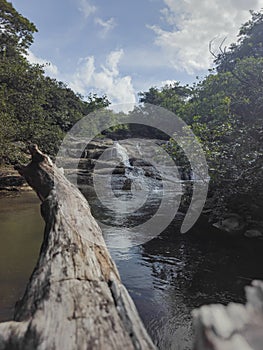 Walk through river waterfalls in Panama