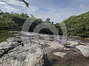 Walk through river waterfalls in Panama