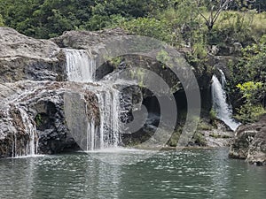 Walk through river waterfalls in Panama