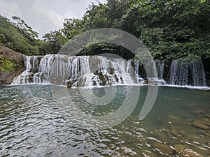 Walk through river waterfalls in Panama