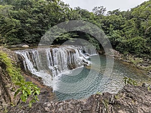 Walk through river waterfalls in Panama