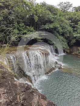 Walk through river waterfalls in Panama