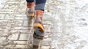 Walk on icy pavement