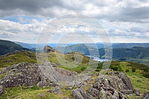 Walker on the summit of Helm Crag