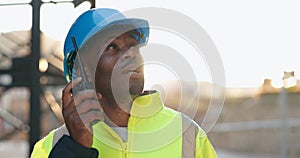 Walkie talkie, engineering and man construction worker on site for inspection with communication. Quality check