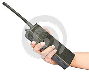 A walkie-talkie in hand