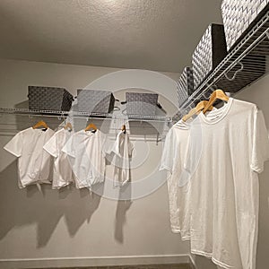 A walkin master bedroom closet in a condominium model home in Orlando, Florida