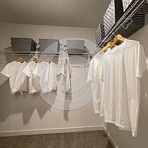 A walkin master bedroom closet in a condominium model home in Orlando, Florida