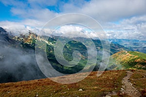 Walking above clouds in slovakian Tatra mountains