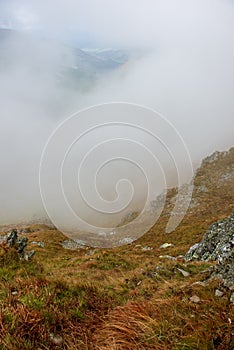 Walking above clouds in slovakian Tatra mountains