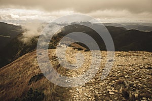 Walking above clouds in slovakian Tatra mountains - vintage retro look