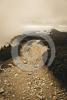 Walking above clouds in slovakian Tatra mountains - vintage retro look