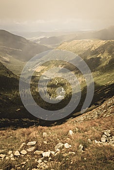 Walking above clouds in slovakian Tatra mountains - vintage retro look