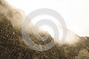 Walking above clouds in slovakian Tatra mountains - vintage retro look