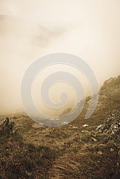 Walking above clouds in slovakian Tatra mountains - vintage retro look