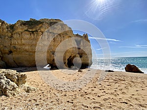 Walking along the cliffs and beach of Praia Da Coelha and Praia do Castelo in Algarve, south of Portugal