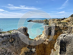 Walking along the cliffs and beach of Praia Da Coelha and Praia do Castelo in Algarve, south of Portugal