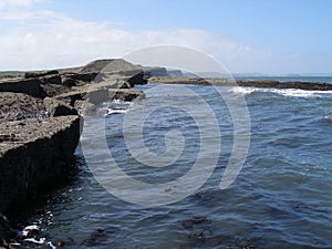 Walking along the the coastal path on filey brigg east coast yorkshire.