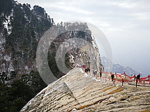 Walking along Hua Shan Mountain top