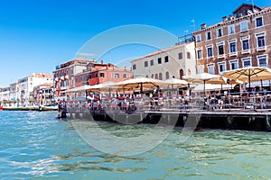 Walking along the narrow streets and canals of Venice, Italy