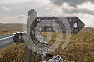 Walking along the Pennine Bridleway between Newby Head Gate to Great Knoutberry Hill near to Ribblehead in the Yorkshire Dales