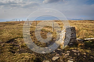 Walking along the Pennine Bridleway between Newby Head Gate to Great Knoutberry Hill near to Ribblehead in the Yorkshire Dales