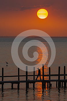 Walking Along a Pier at Sunset in Fairhope, Alabama