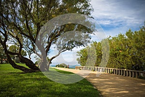 Walking on beautiful coastal pathway visiting marvellous scenic seascape of Biarritz, basque country