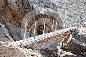 Walking Bridge along a mountain trail in Dolomiti FANES