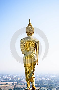 Walking Buddha statue