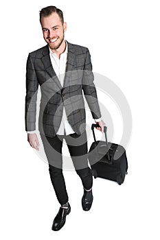 Walking businessman pulling a bag