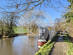 Walking down the canal footpath by the narrowboats